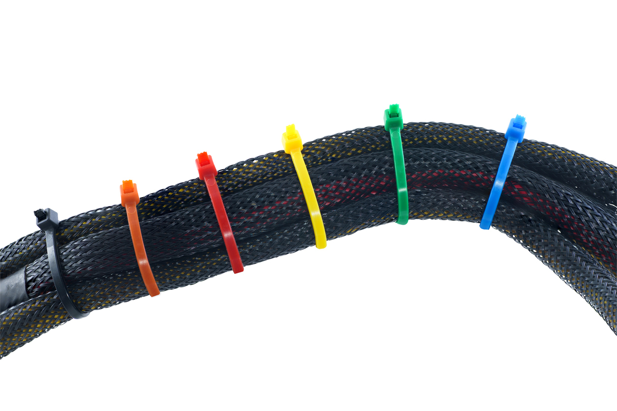 cable ties being used to tie braided sleeving together