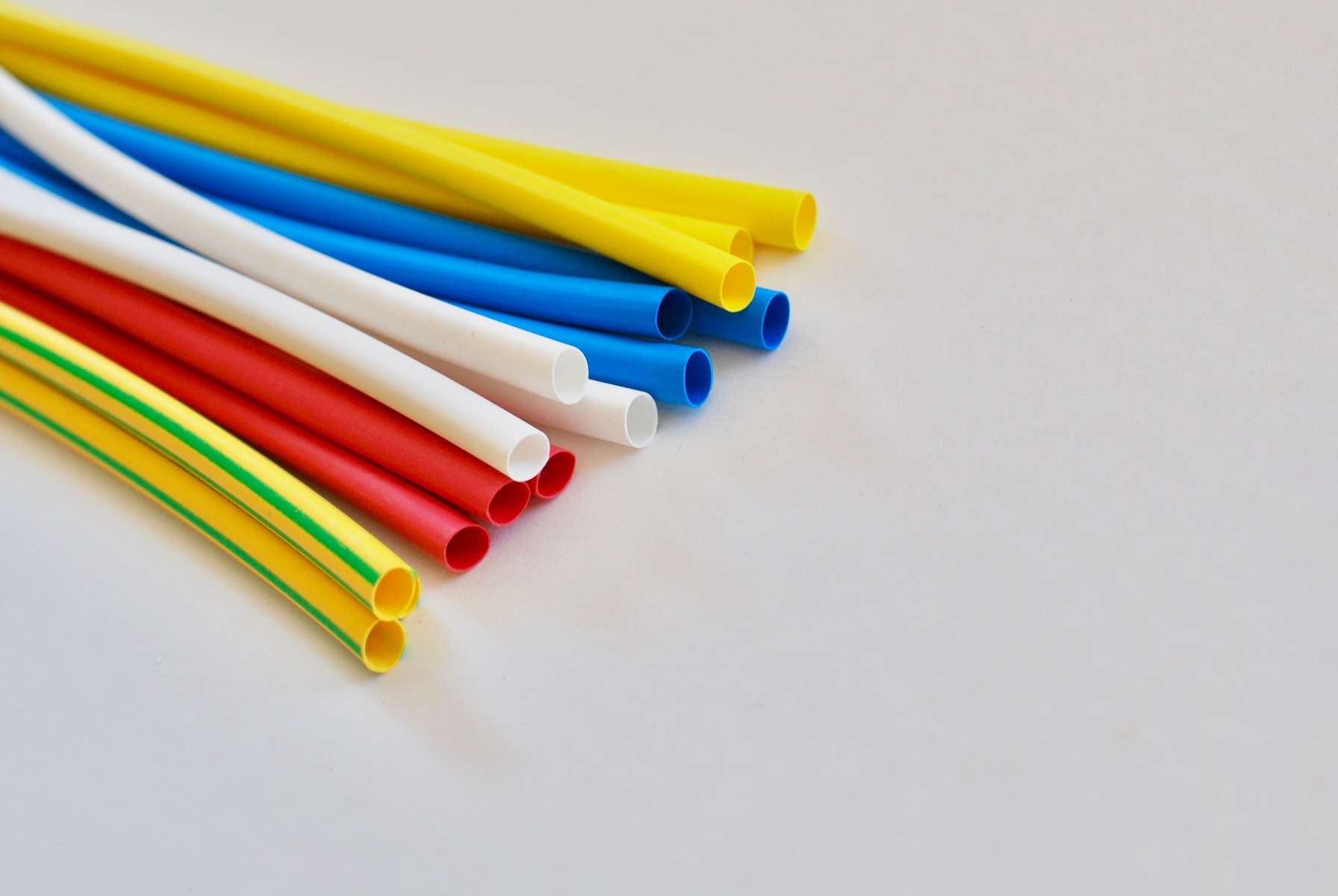 Several colors of heat shrink tubing with very similar sizes.